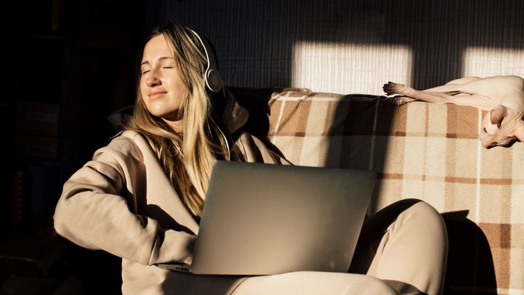 calm woman working from her living room